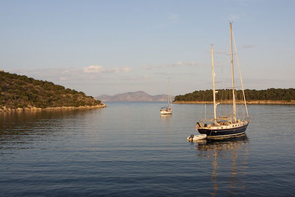 Photo of the sea with a couple of yachts