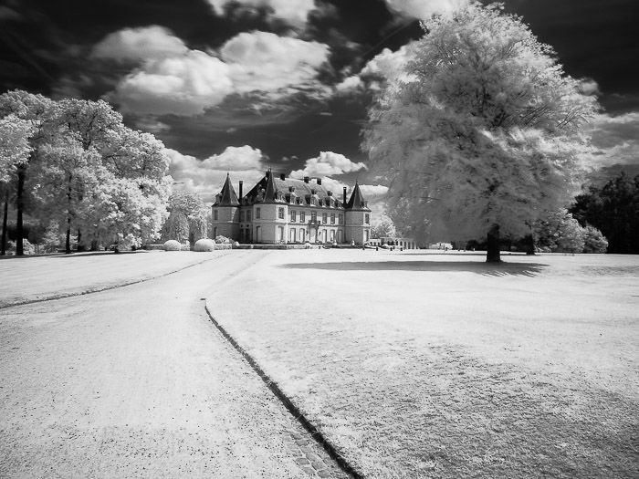 A black and white infrared photography of The Chateau de la Hulpe