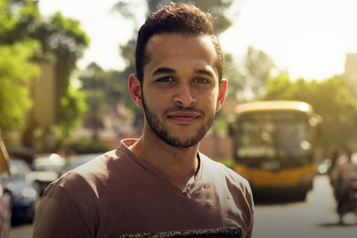 An outdoor portrait of young man taken with a 50mm lens