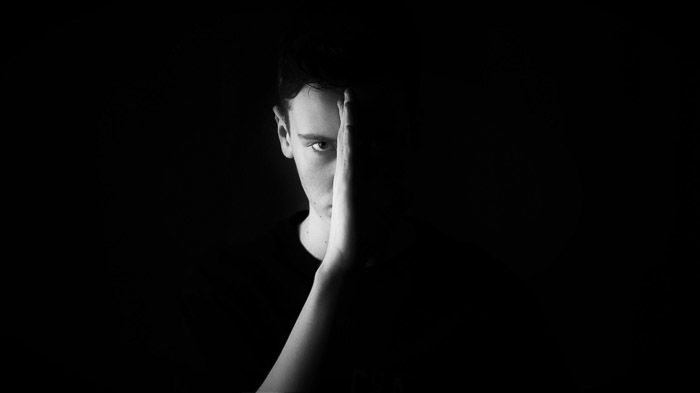 Atmospheric black and white portrait of a man