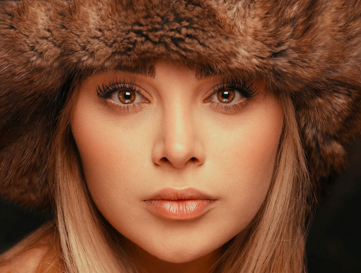 Close-up of a woman looking directly at the camera as eyeline photography