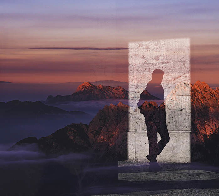 Two images combined to a double exposure, using a male shadow and a mountain landscape