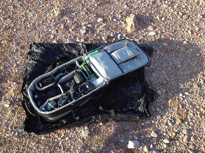 photo of using a garbage bag to protect your camera during desert photography