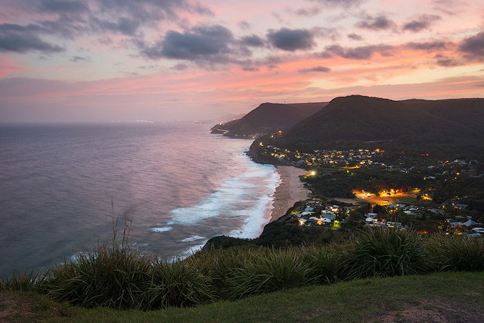 Aerial seascape Photography of a coastal town at sunset 