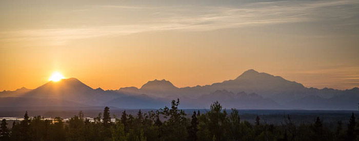 A beautiful panoramic sunset photo of Alaskan landscape