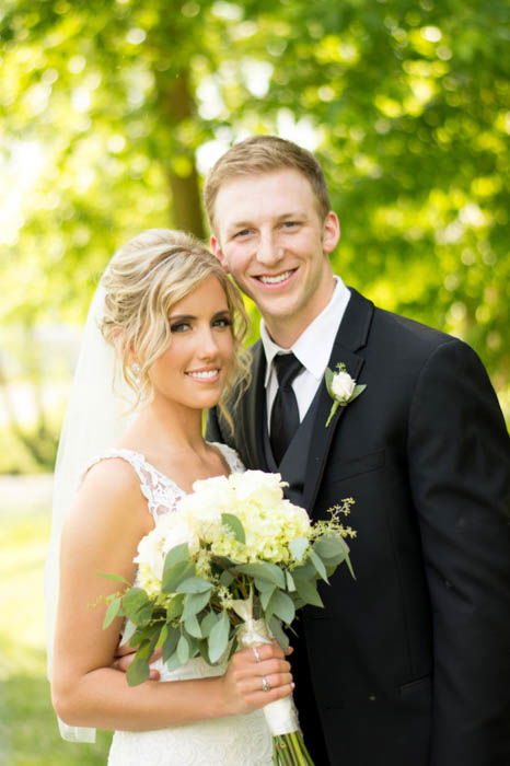 wedding photography of a bride and groom, with photography reflectors used for better light