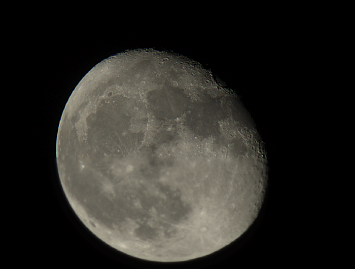 sharp black and white photo of the moon