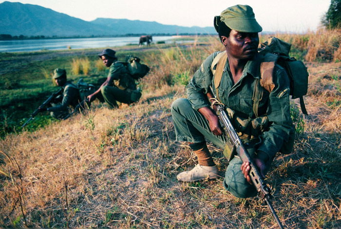 Soldiers in a field by Deborah Copaken female photographer