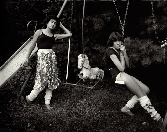 Portrait of kids on swings by Sally Mann