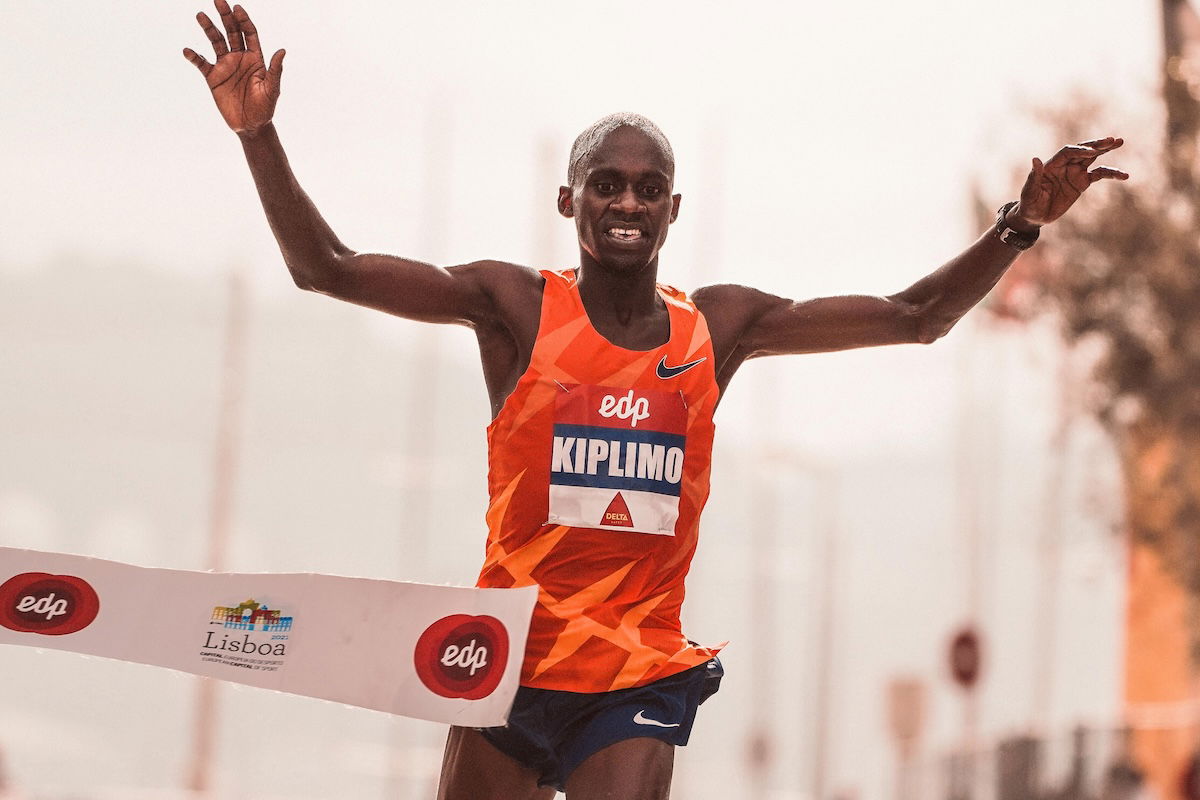 A runner crossing the finish line first as an example of marathon photography