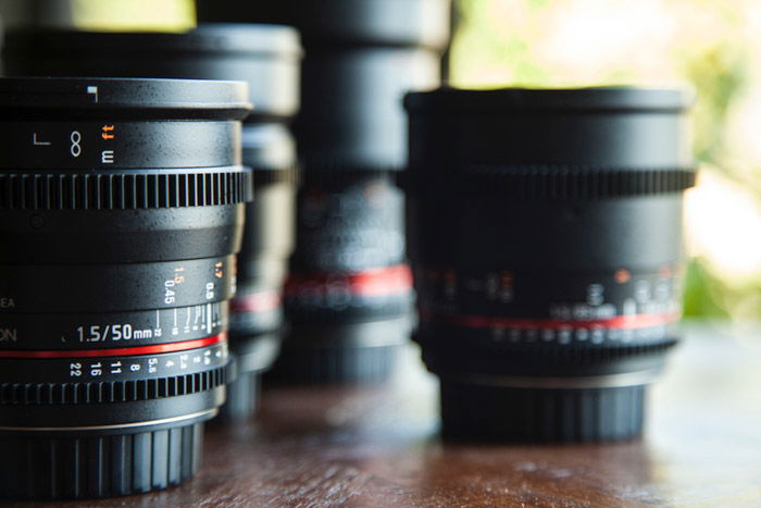 a selection of camera lenses for adventure photography