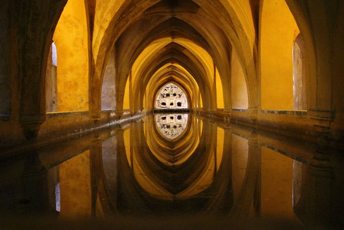 Interior shot of the corridor at Royal Alcázar of Seville, Spain