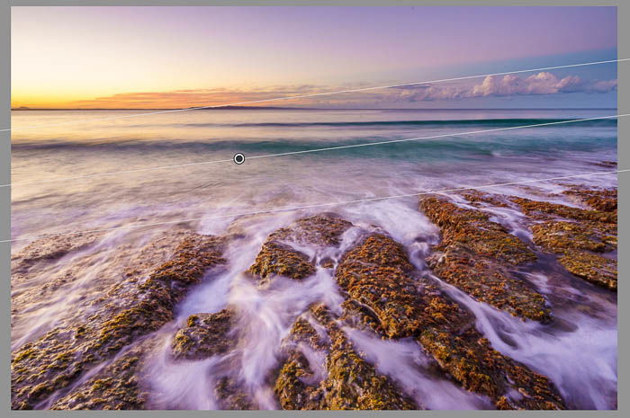 Screenshot of seascape photography being edited using Lightroom graduated filter tool