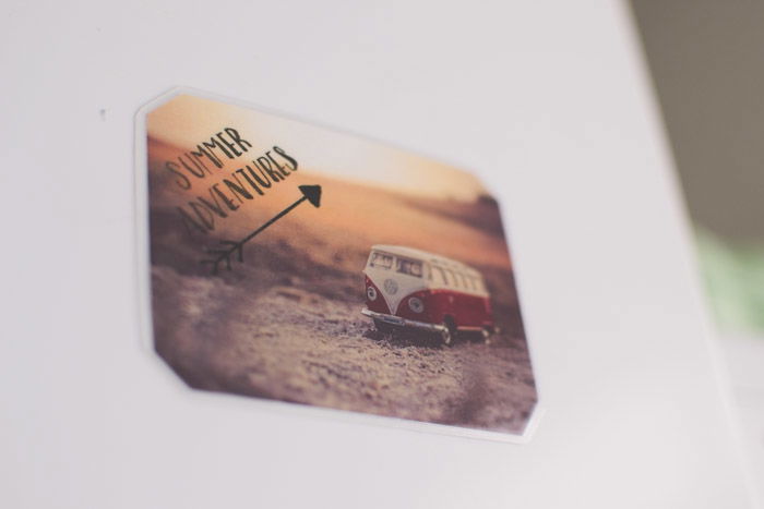 A unique photo gift of a magnet of a Volkswagen van with the text Summer Adventures as an idea of what to do with photos