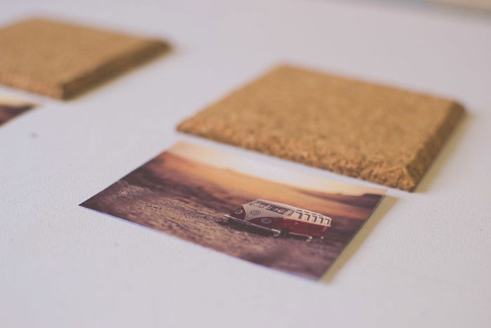 A photograph of a van beside a wooden coaster as an idea of what to do with photos