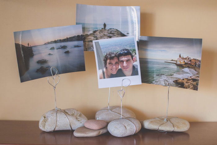 Four stone photo holders with photographs as unique photo gifts ideas for what to do with photos