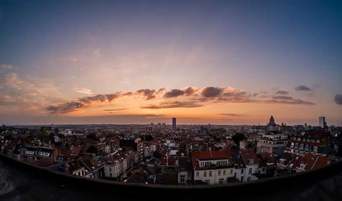 Brussels cityscape and skyline taken from the roof of a tall building at sunset. Urban photography