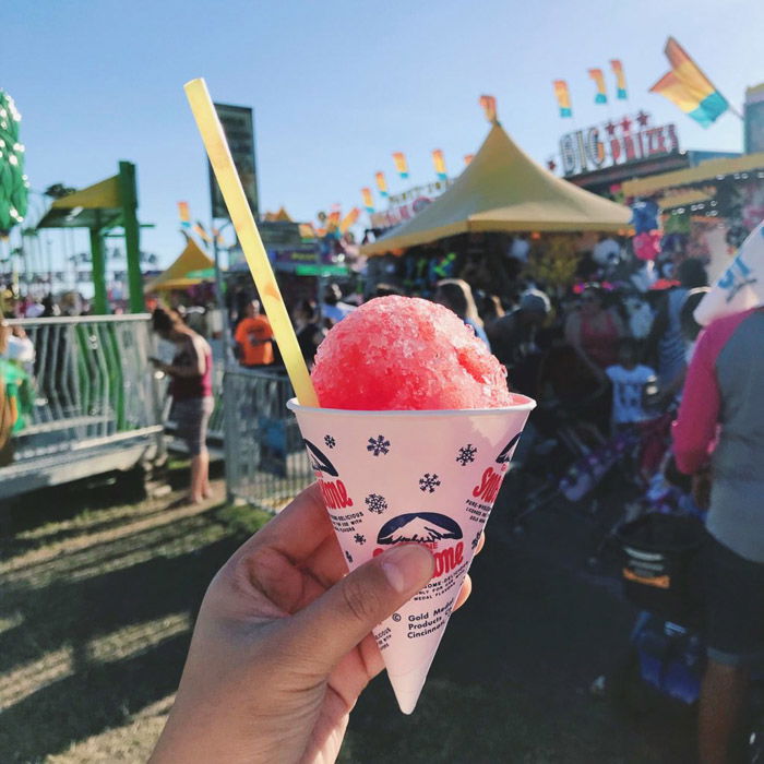 Close up photo of a hand holding an ice cream. Instagram tips for social media photography.