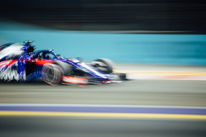 A blurry shot of a F-1 race car