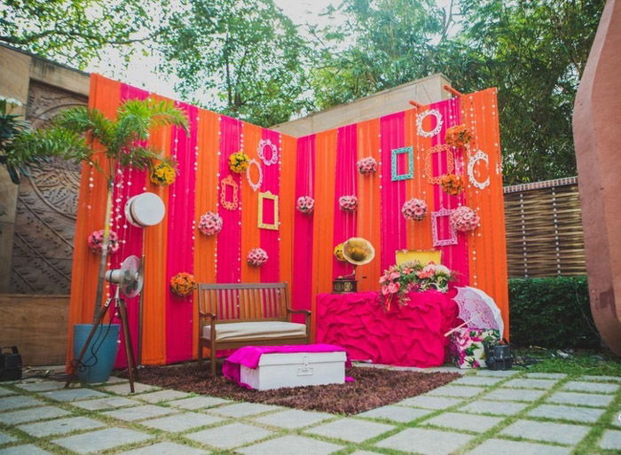 an image of a neon themed wedding photo booth