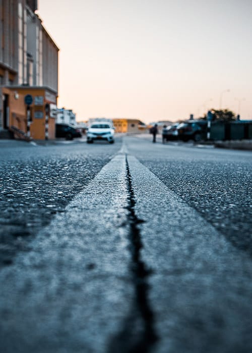 A low angle street photo taken from the center of the road - using aspect ratio in photography