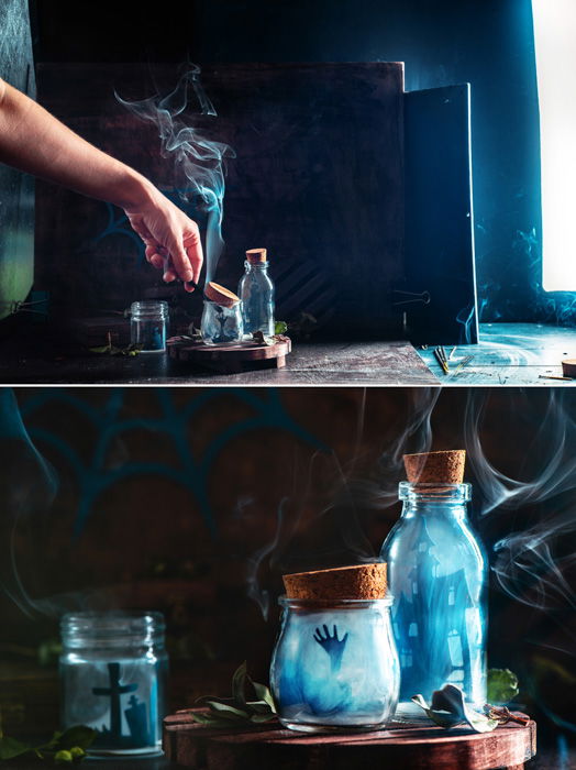 A setup for a still-life smoke photography shot with glass bottle silhouettes of tiny cutout characters inside and smoke billowing out