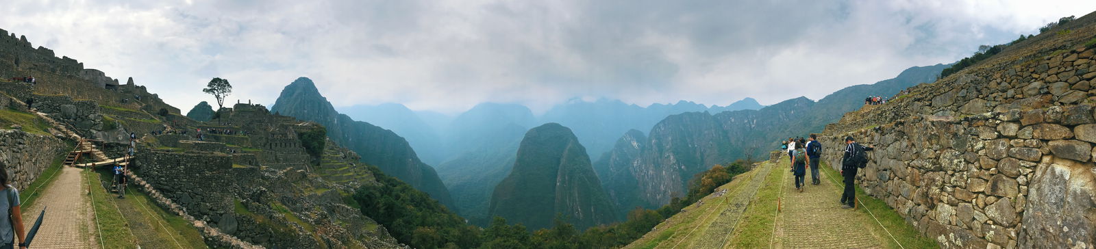 A landscape travel panorama of mountains and stone walls taken with an iPhone