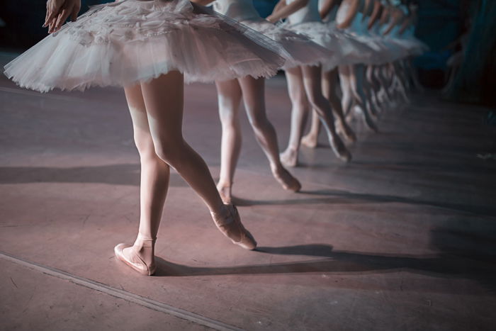 A ballet dancer in mid-dance pose.