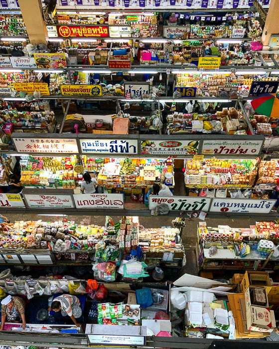 view from the top of many stalls at a market