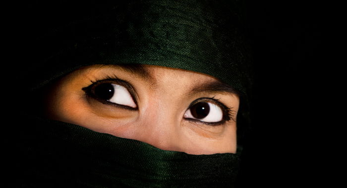 Close up of beautiful dark eyes of an Asian Woman. - using photography props