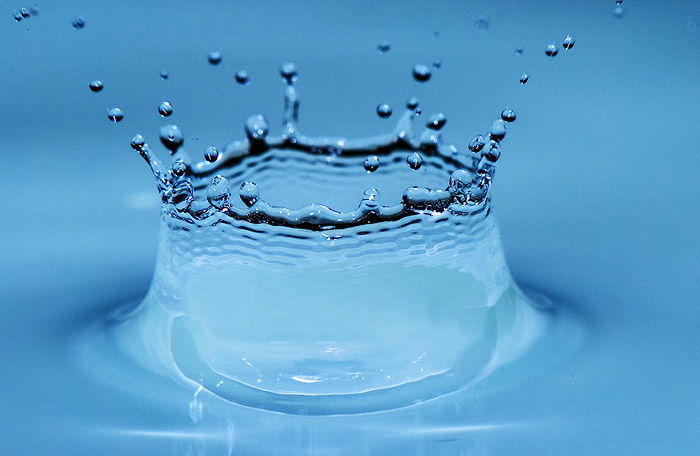 close up details of a splash from a drop of water