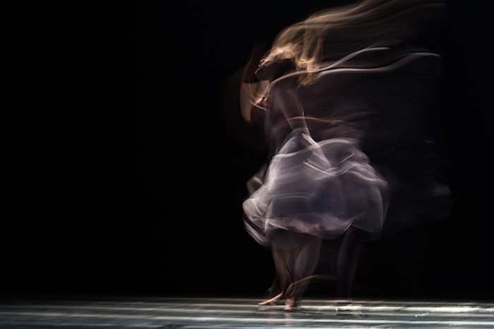 Artistic impressionist photography of a dancer performing onstage