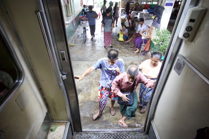 Photo of people coming up the stairs to board a train