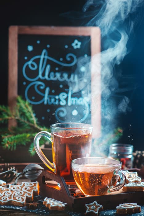 A christmas still life photography shot of hot drinks and steam