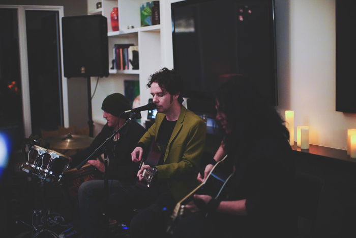 Three musicians performing, shot with a Sony a7R II camera