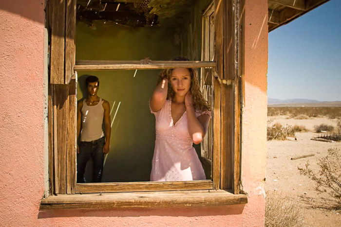 A lifestyle photo shoot with two TFP models posing by a windowsill