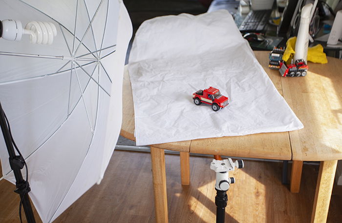 A basic kitchen table set-up for photographing toys at home