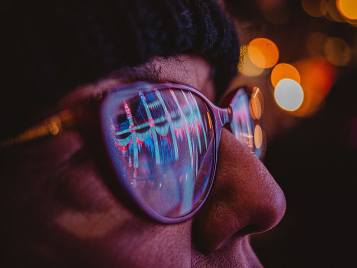 Beautiful Christmas bokeh lights in the background of a close up portrait