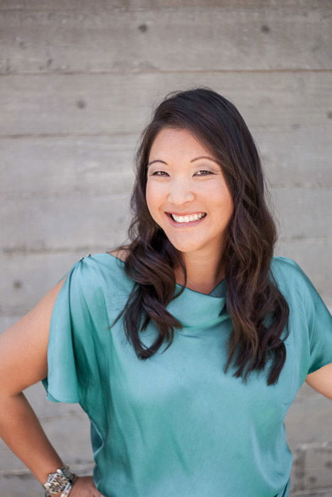 A portrait of a female model outdoors demonstrating good headshot poses 