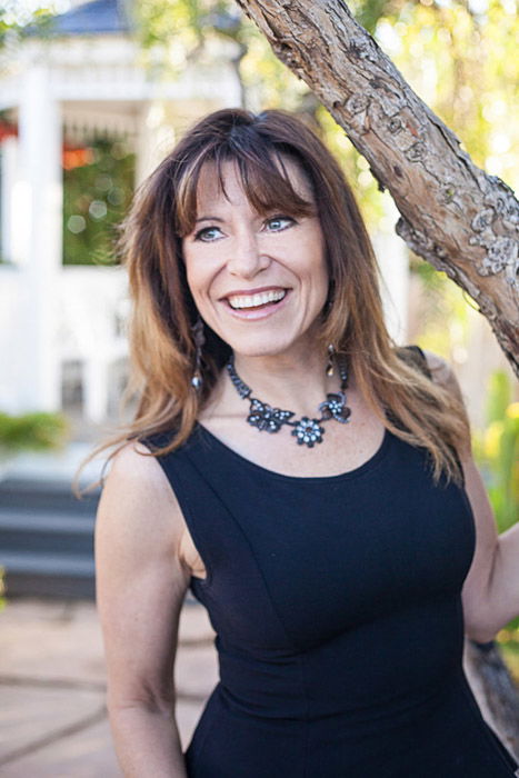 A portrait of a female model outdoors demonstrating good headshot poses