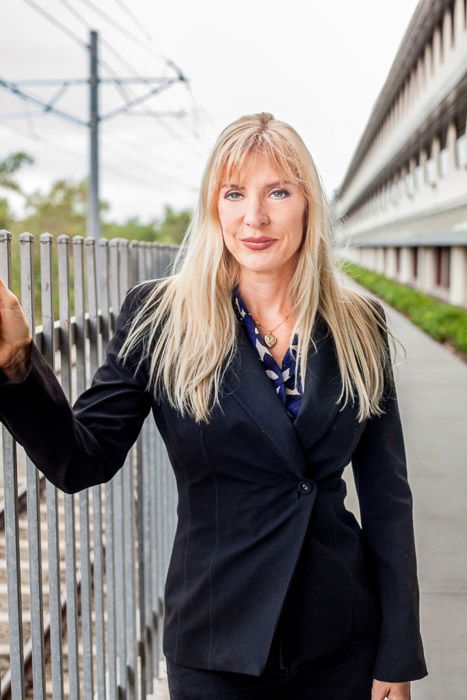 A portrait of a female model outdoors demonstrating good headshot poses