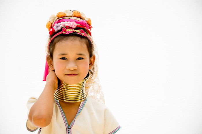 A high key portrait of a Thai girl in traditional clothing 