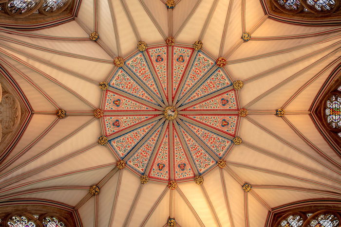 An abstract photography example taken looking up at a decorated roof 