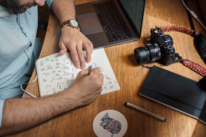 Overhead shot of a person making a photography marketing ideas