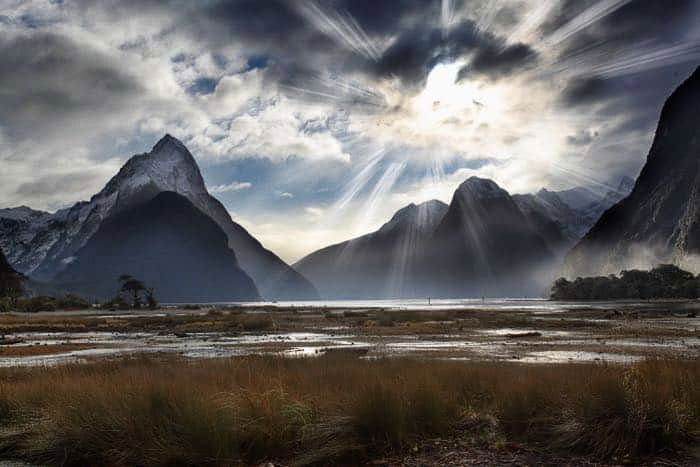 A mountainous landscape image with dramatic sky created using Photoshop Lighting effects