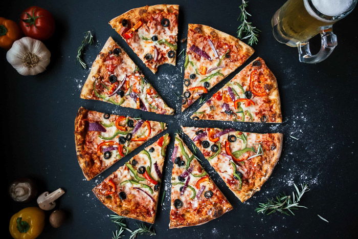 Overhead shot of a sliced pizza