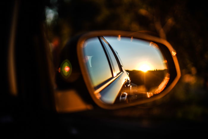 A car reflected in its own side mirror