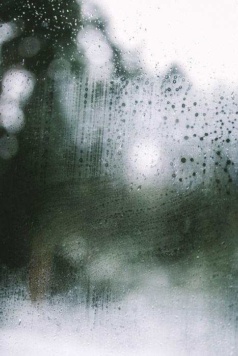 An abstract pattern on a rainy window - abstract landscape photography