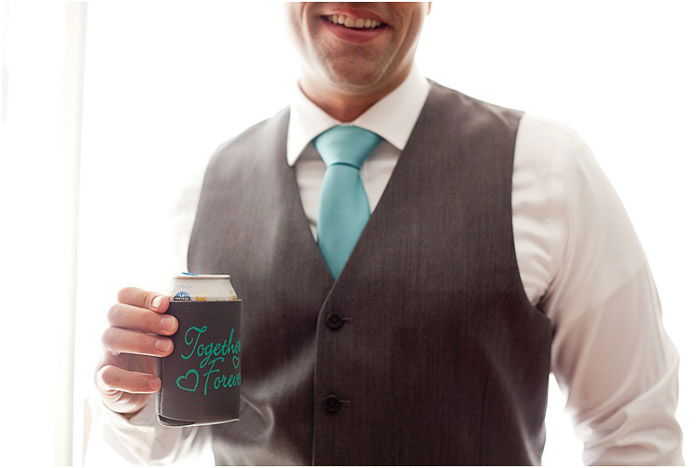 Casual wedding portrait of a groomsman posing outdoors at a destination wedding 