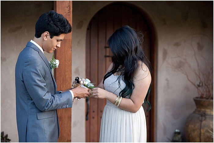 Cute prom photography of a teen couple posing outdoors